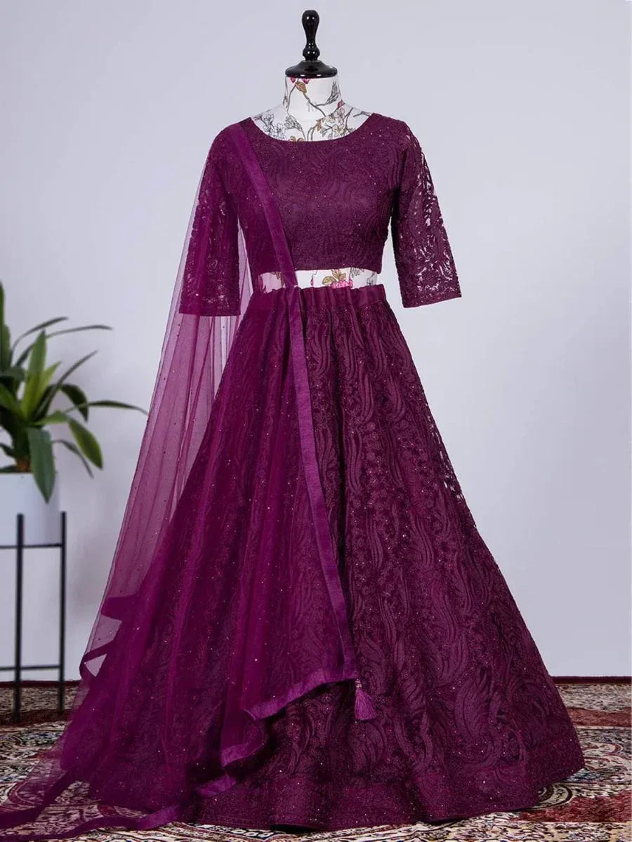 Elegant purple lace lehenga choli with sheer dupatta, perfect for Indian ethnic occasions