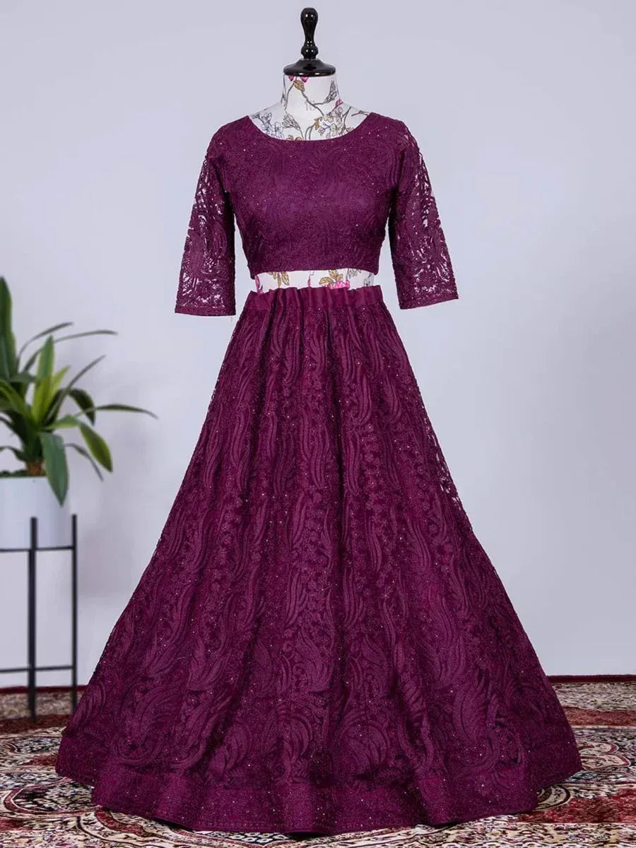 Purple lace ethnic gown with 3/4 sleeves and flared skirt, perfect for Indian occasions