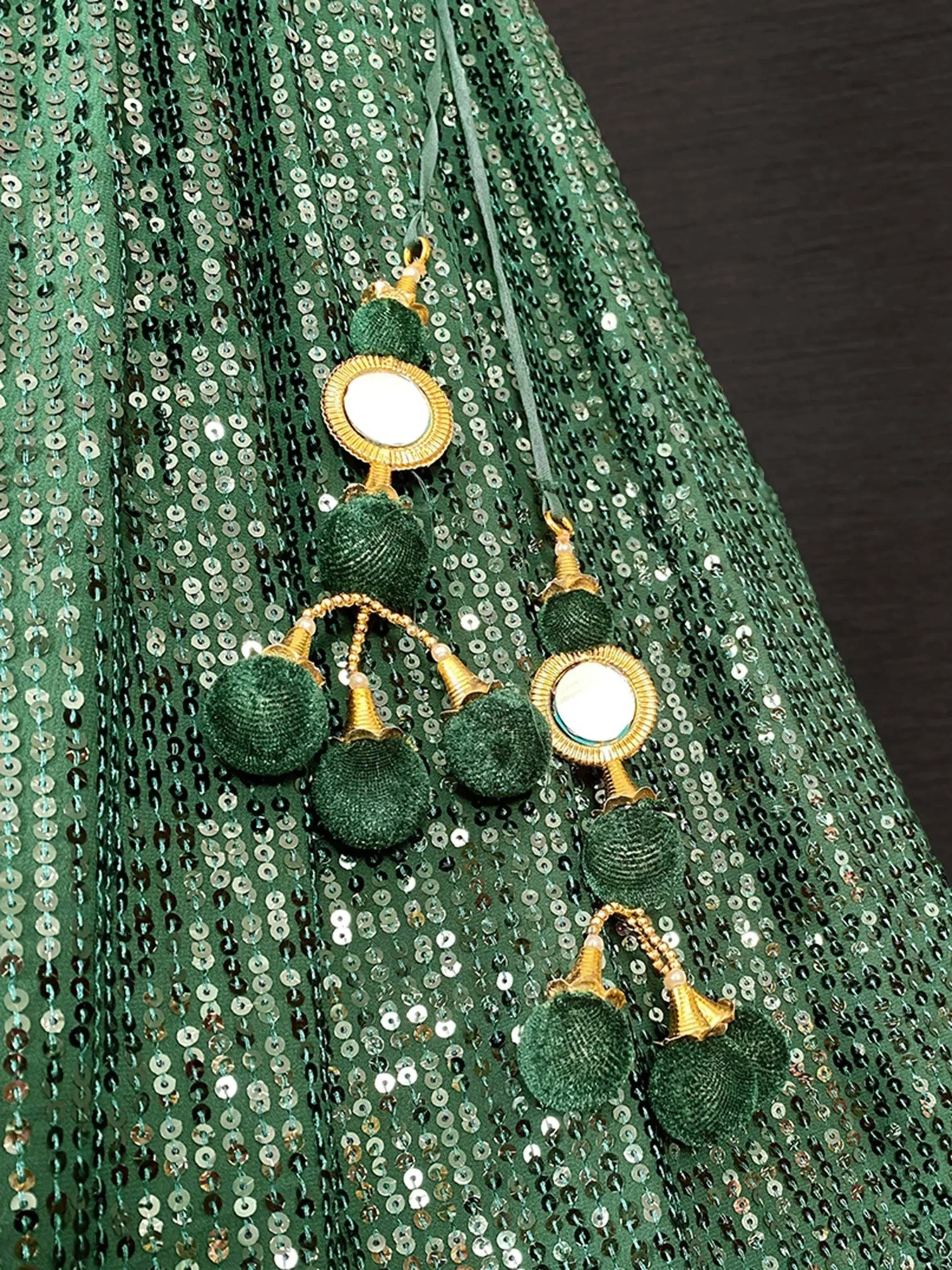 Emerald green sequin ethnic gown with mirror and tassel embellishments