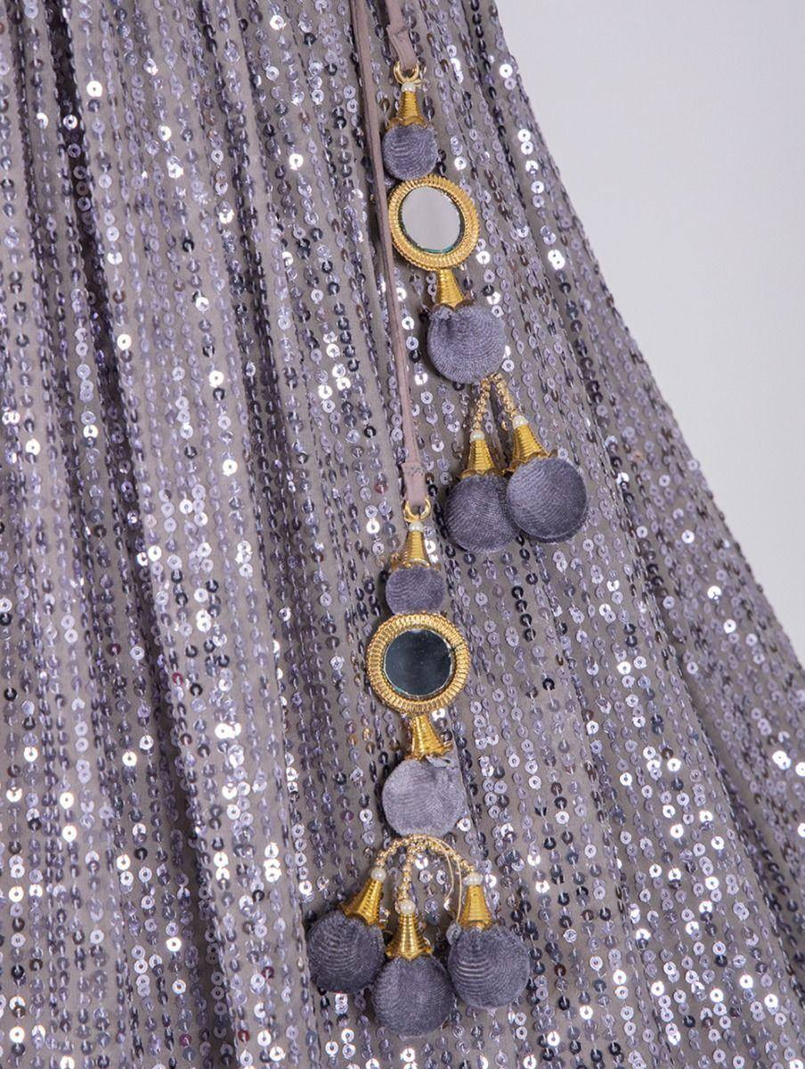 Grey sequin lehenga with gold mirror and pom-pom tassels, ethnic Indian wear