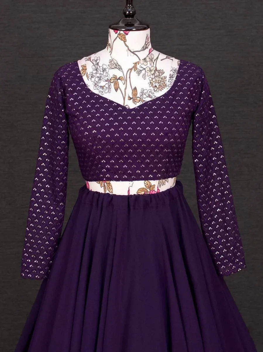 Purple ethnic gown with floral print bodice and long sleeves, perfect for Indian occasions