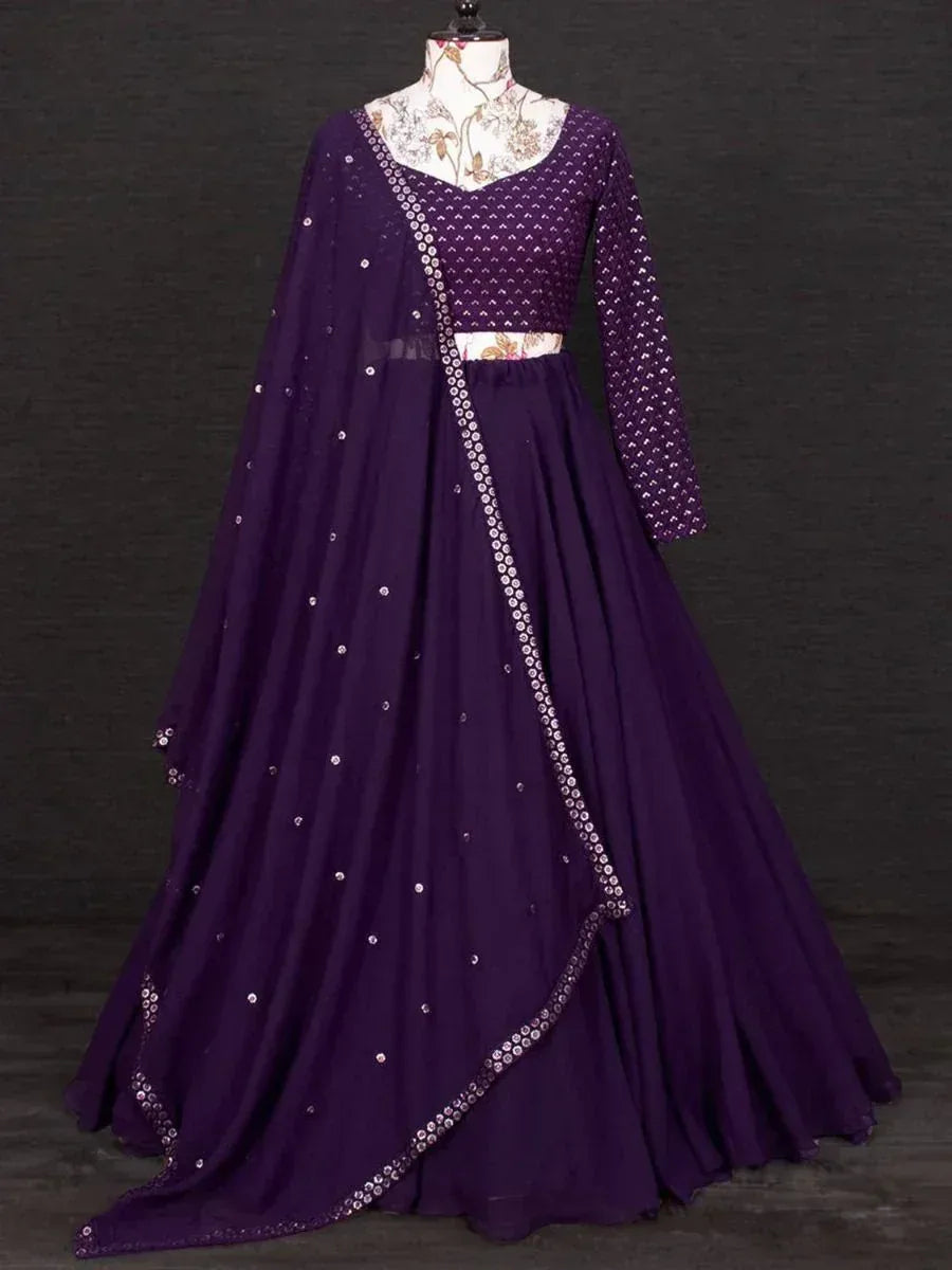 Purple ethnic anarkali gown with sequin detailing, perfect for Indian weddings and festive occasions.
