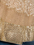 Astonishing Light brown Sequins Embroidered Net Lehenga Choli