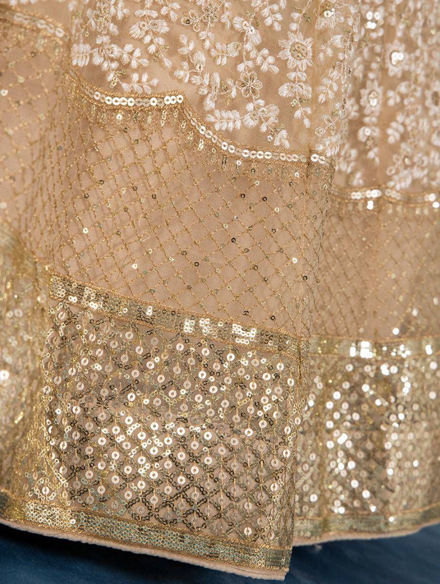 Gold sequin and floral embroidery on sheer ethnic gown fabric, perfect for Indian festive wear.