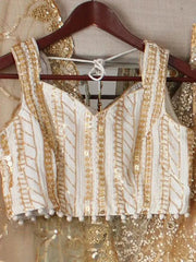 Astonishing Light brown Sequins Embroidered Net Lehenga Choli