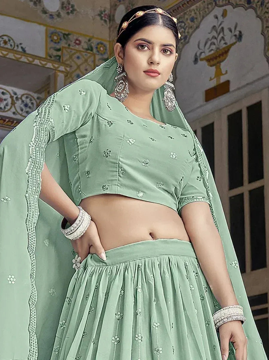 Mint green embroidered lehenga choli with dupatta, perfect for Indian ethnic occasions