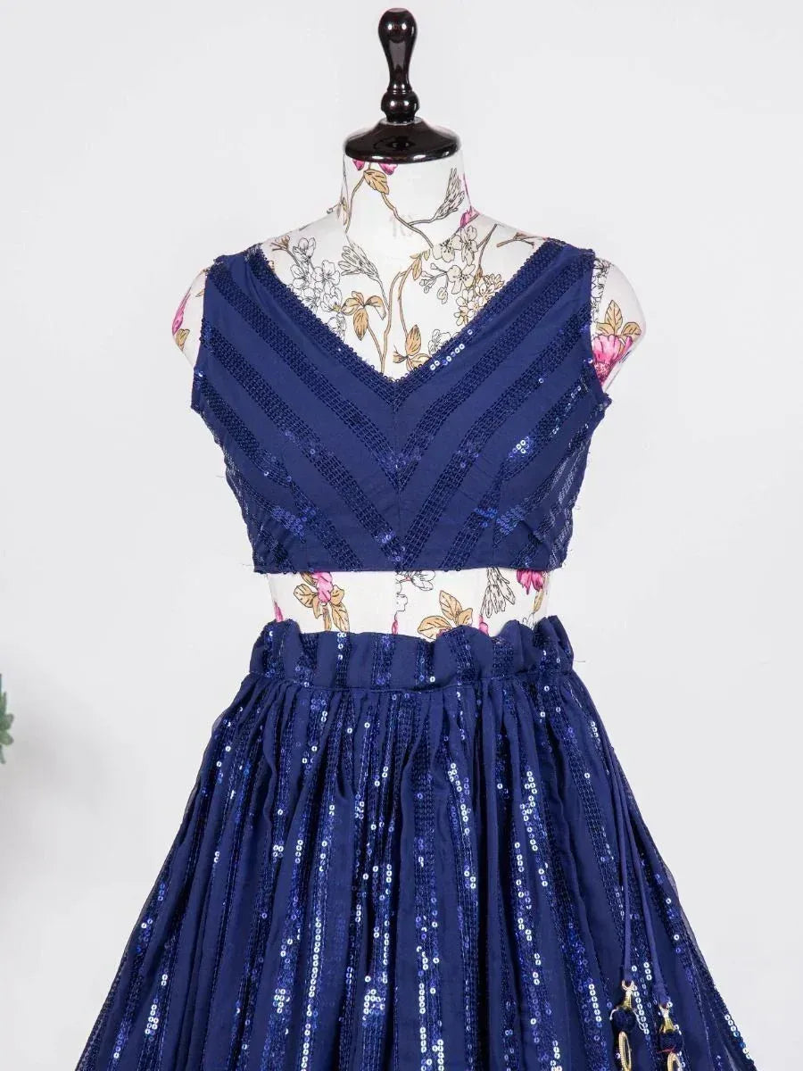 Navy blue sequin lehenga choli with V-neck top and flared skirt, ethnic Indian wear
