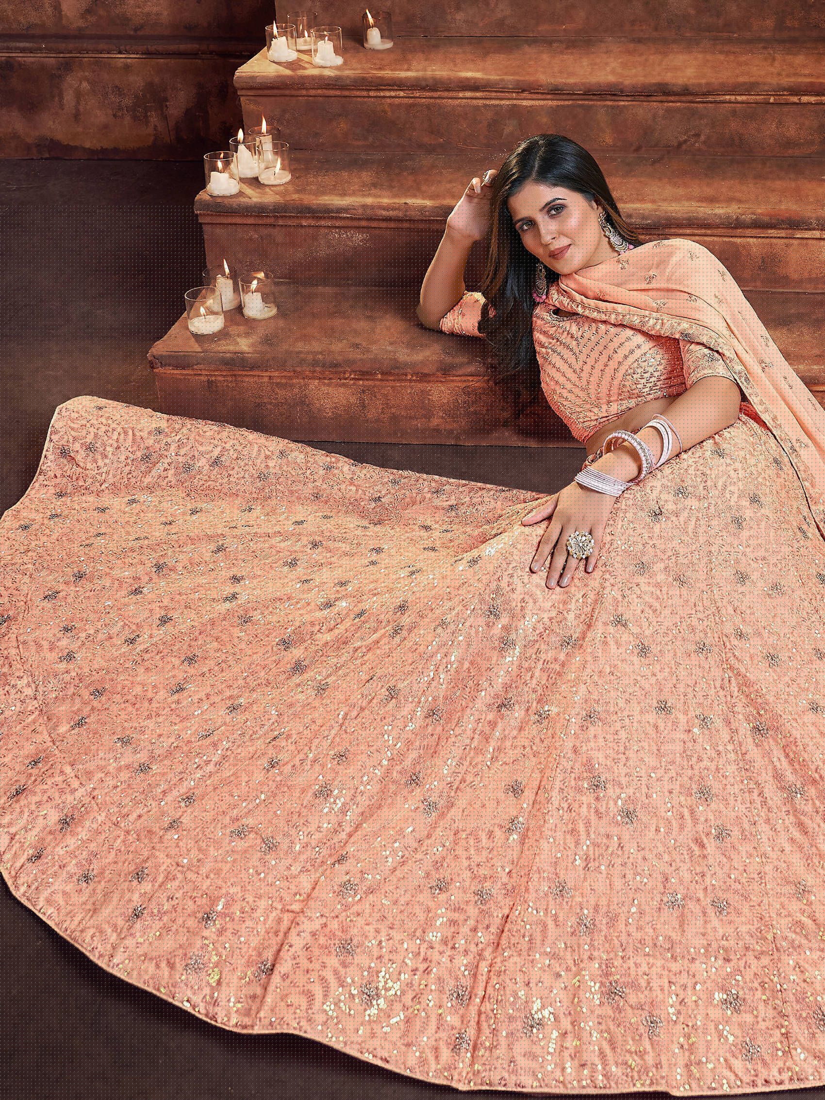 Alluring Peach Sequins Embroidered Georgette Wedding Wear Lehenga Choli