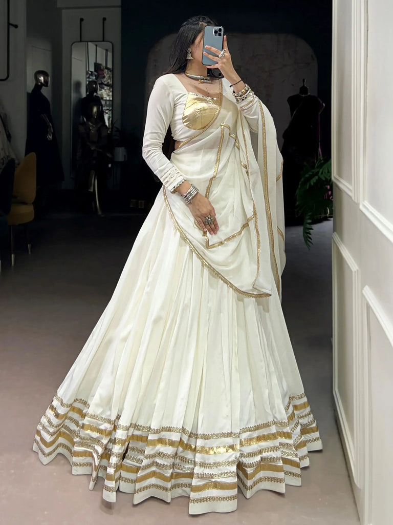 Ravishing White Rayon Gota Patti Work Navratri Wear Lehenga Choli