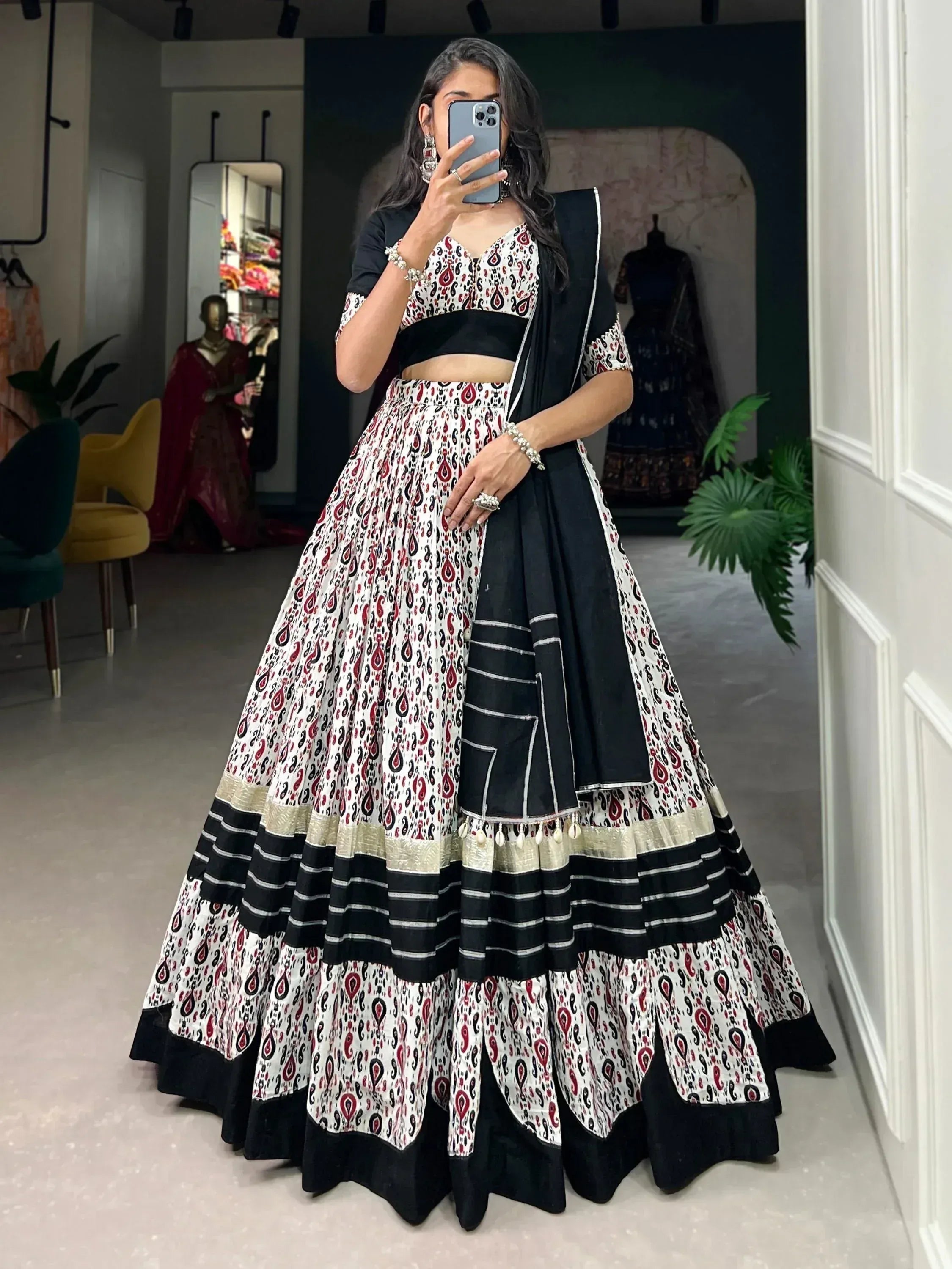 Black and white printed lehenga choli with paisley design, perfect for Indian ethnic wear occasions
