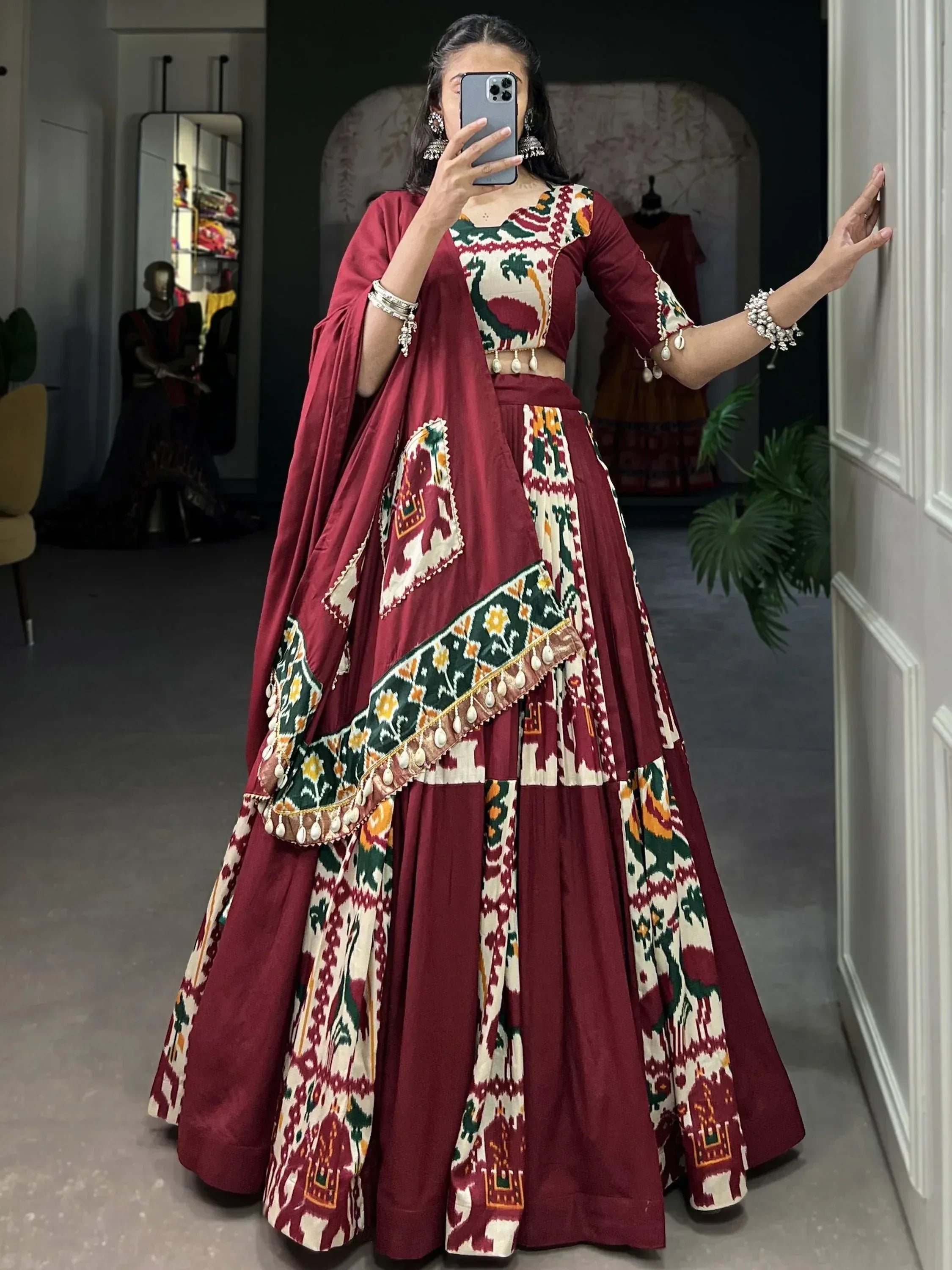 Maroon ethnic lehenga choli with ikat print, perfect for Indian weddings and festive occasions