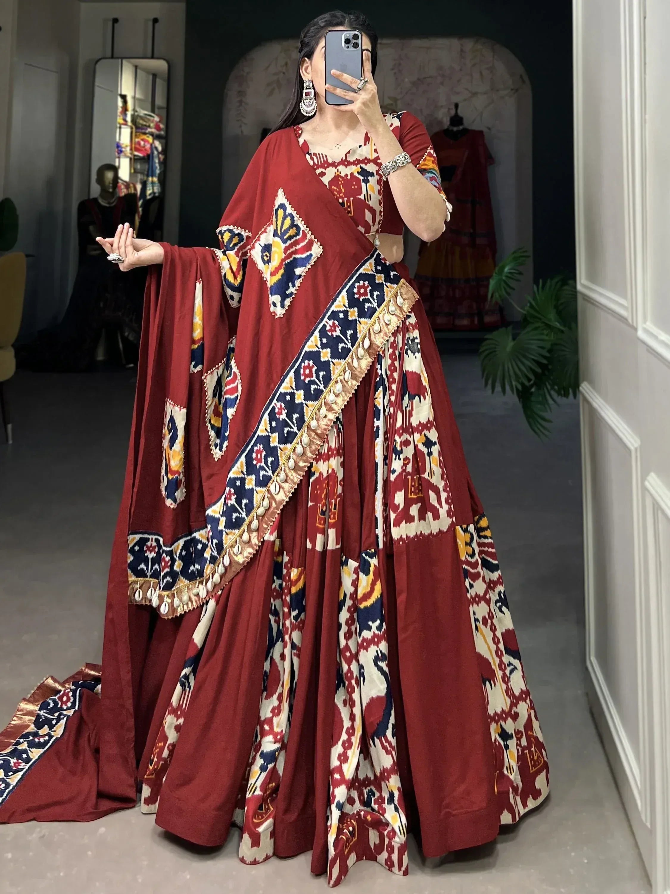 Red printed lehenga choli with ethnic patterns and dupatta, perfect for Indian weddings and festive occasions