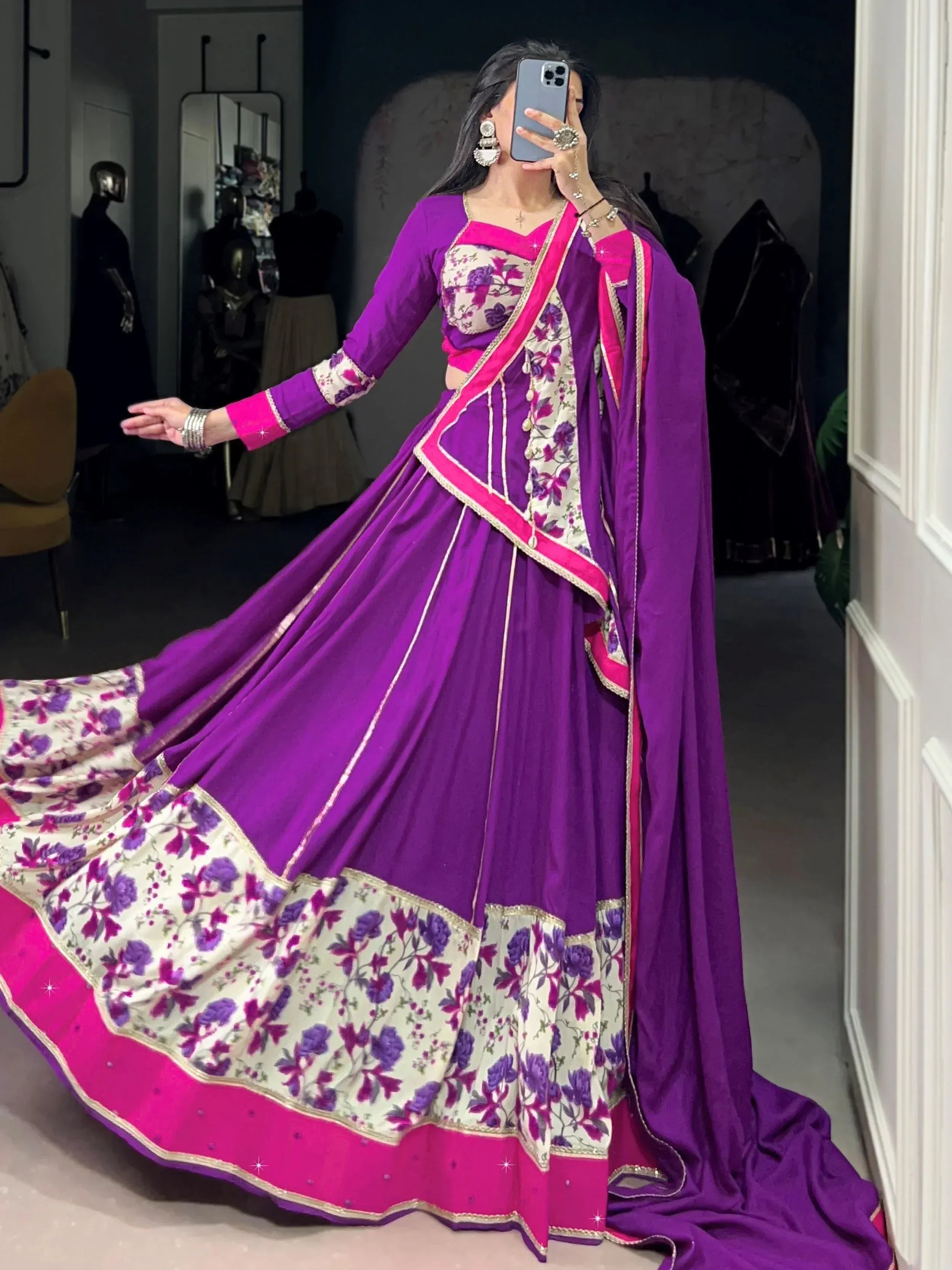 Purple and pink floral lehenga choli with gold trim, perfect for Indian ethnic wear occasions