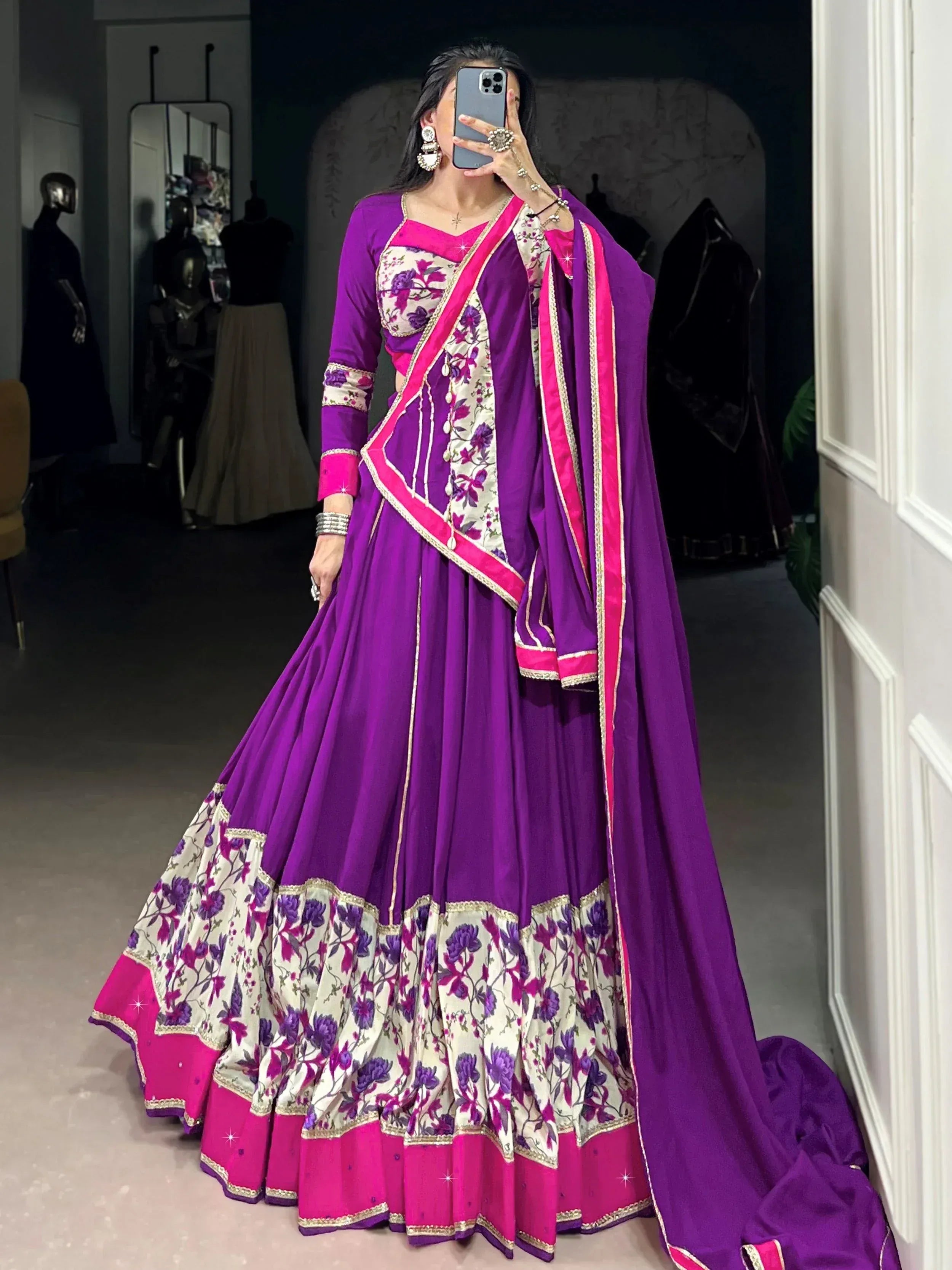 Purple and pink floral lehenga choli with embroidered dupatta, perfect for Indian ethnic wear occasions.