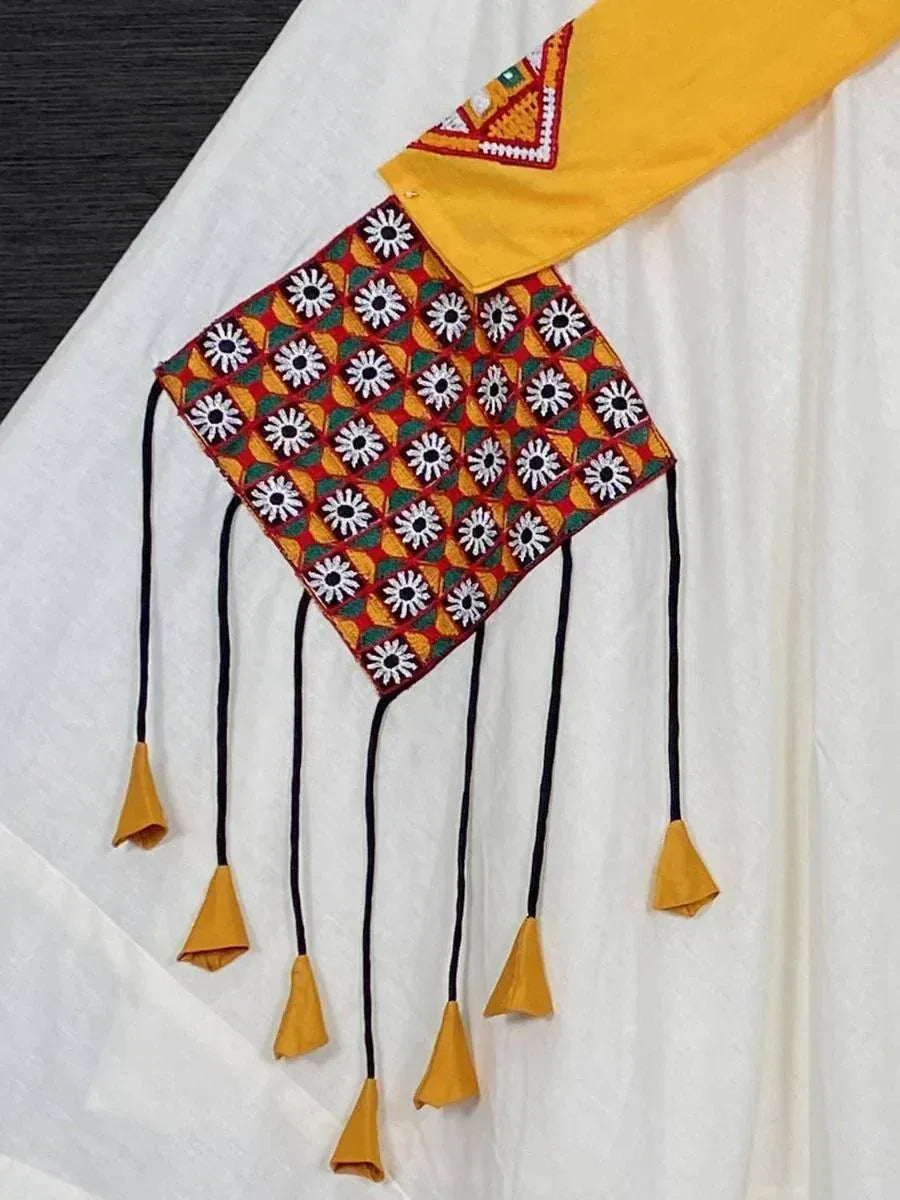 Yellow ethnic blouse with floral embroidery and tassels, perfect for traditional Indian wear