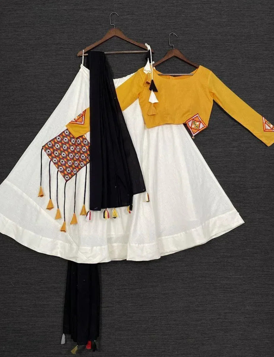 Yellow embroidered top with white flared skirt and black dupatta, Indian ethnic wear set