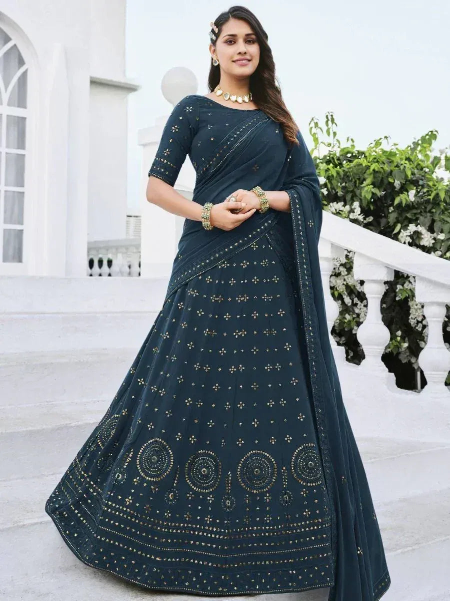 Dark green embroidered lehenga choli with gold detailing, perfect for Indian ethnic wear occasions