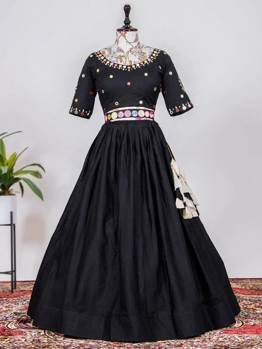 Black ethnic gown with colorful mirror work and floral embroidery, perfect for Indian festive occasions.