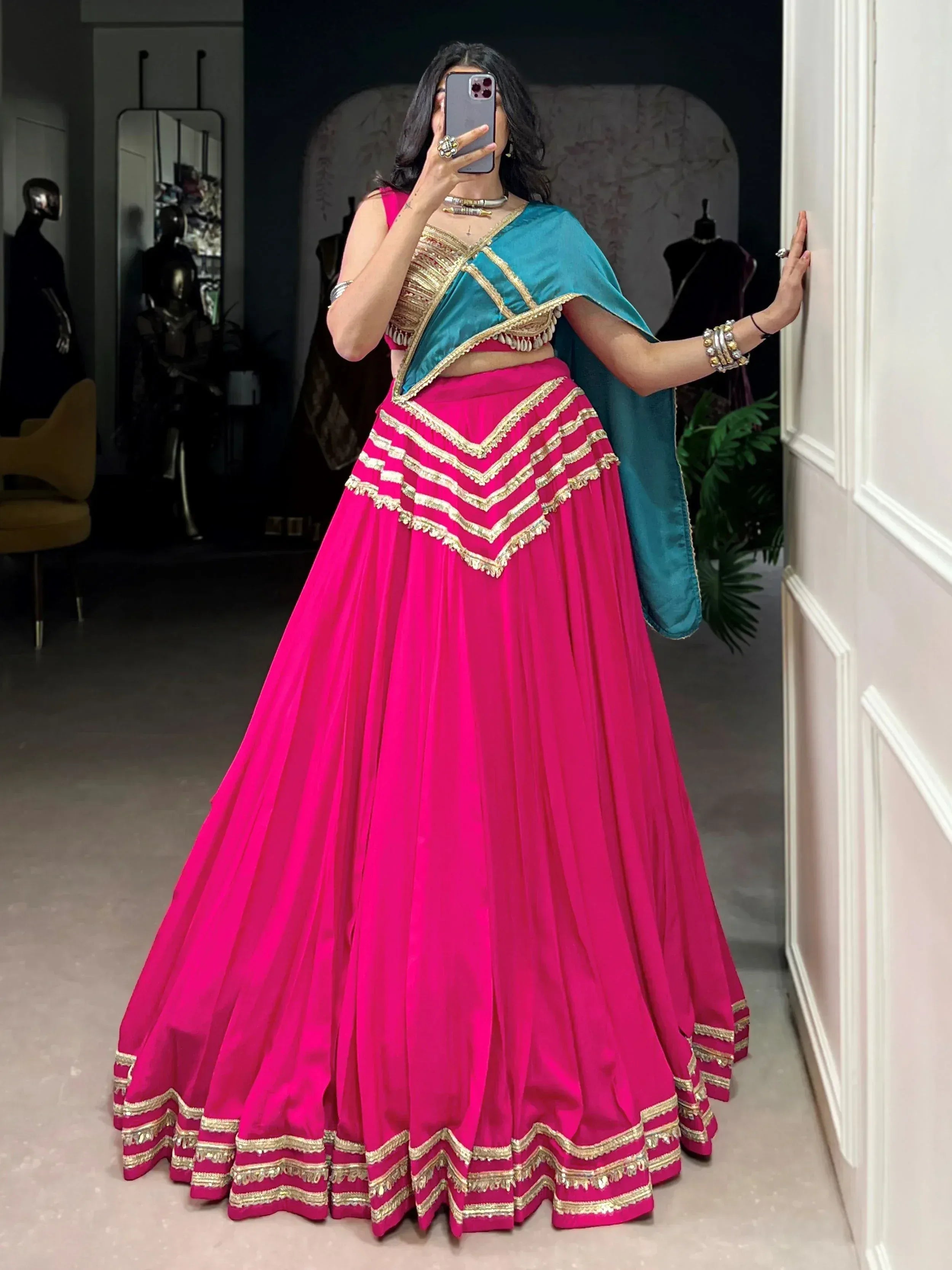 Fuchsia pink lehenga choli with gold embroidery and teal dupatta, Indian ethnic wear