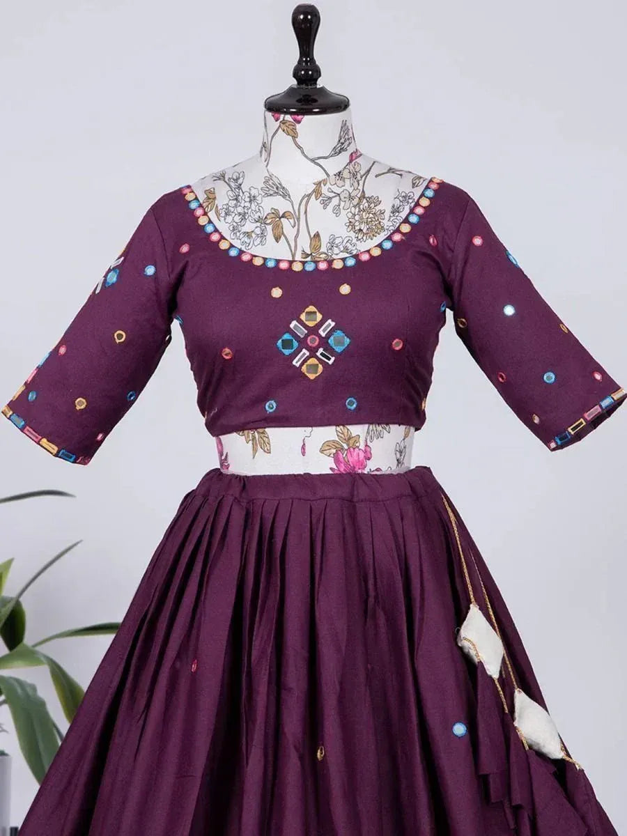 Purple ethnic lehenga choli with floral print and colorful mirror work, perfect for Indian occasions