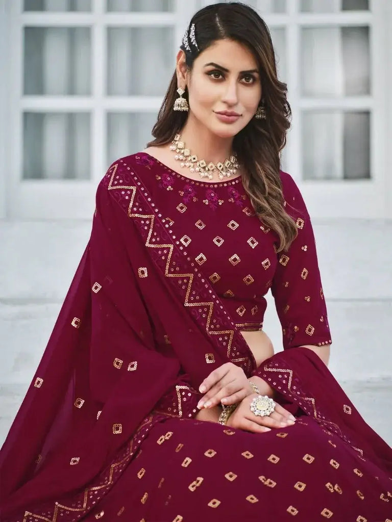 Attractive Dark Pink Sequined Georgette Party Wear Lehenga Choli