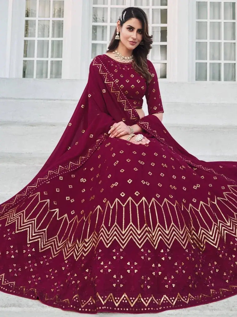 Attractive Dark Pink Sequined Georgette Party Wear Lehenga Choli