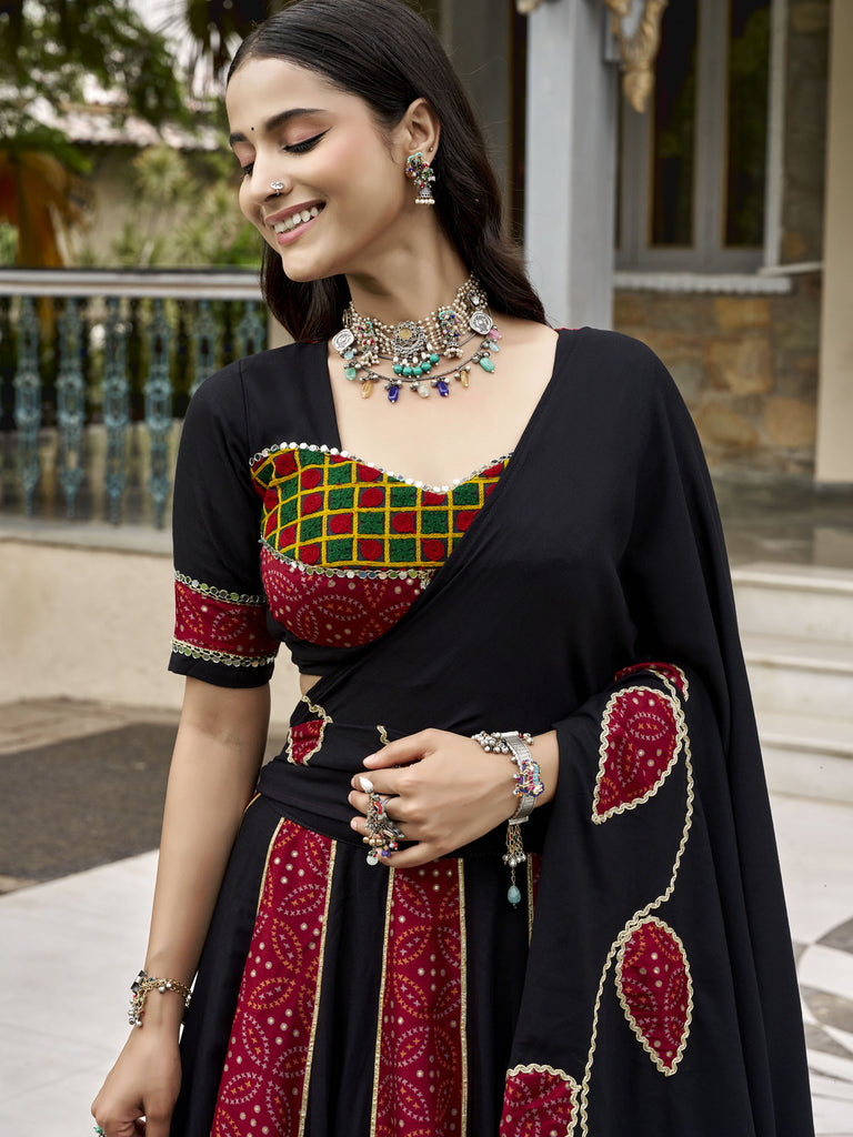 Wonderful Black Printed Rayon Navratri Wear Lehenga Choli With Dupatta
