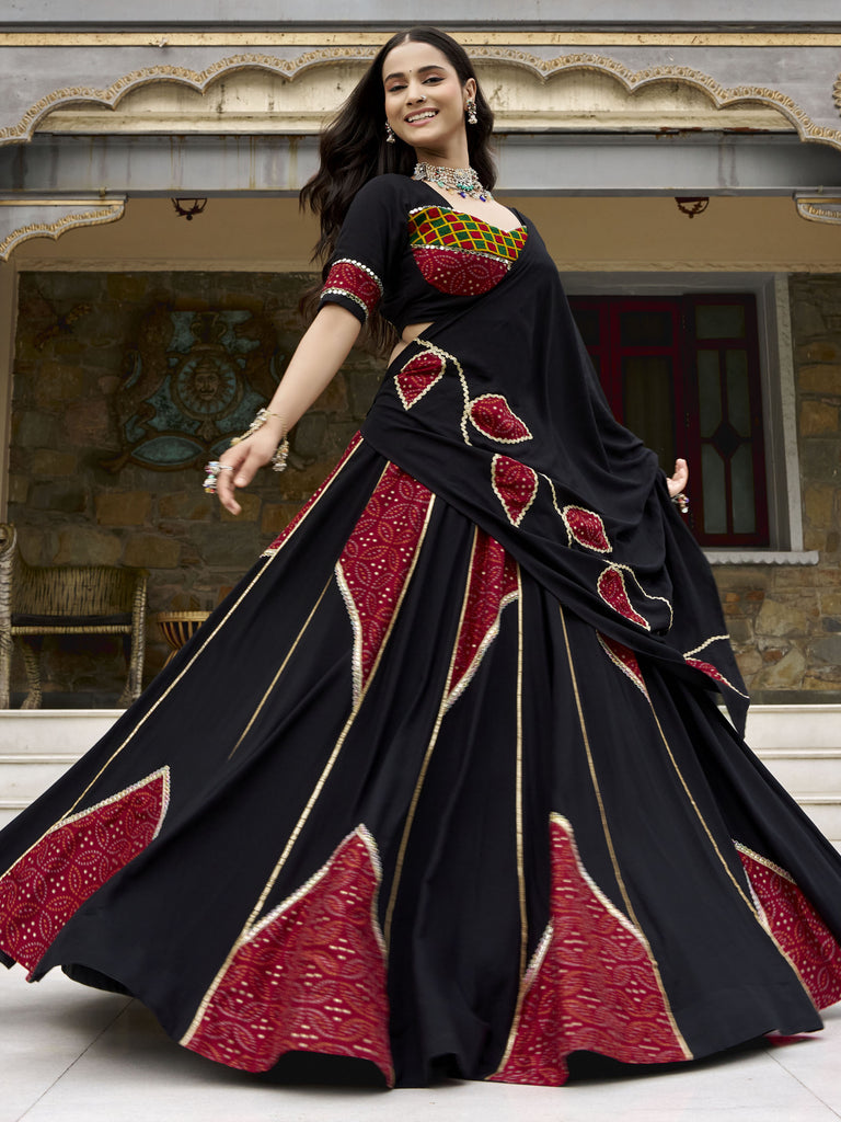 Wonderful Black Printed Rayon Navratri Wear Lehenga Choli With Dupatta