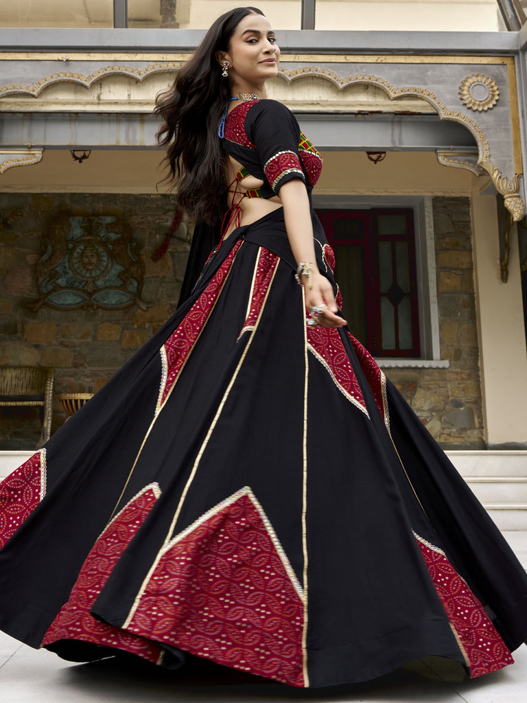 Wonderful Black Printed Rayon Navratri Wear Lehenga Choli With Dupatta