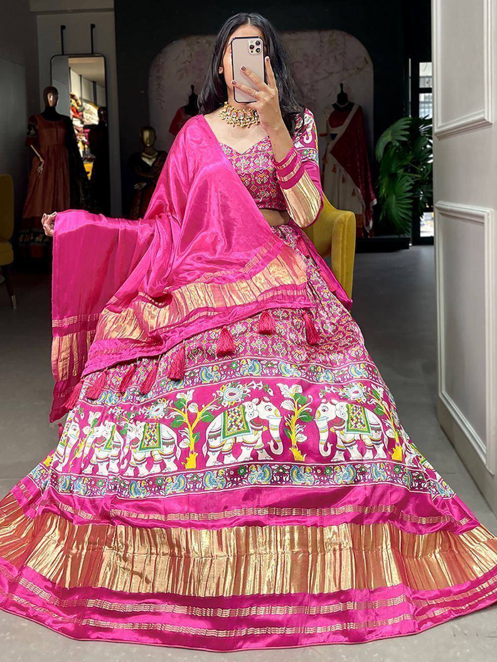 Pink embroidered lehenga choli with elephant print, perfect for Indian ethnic wear and festive occasions
