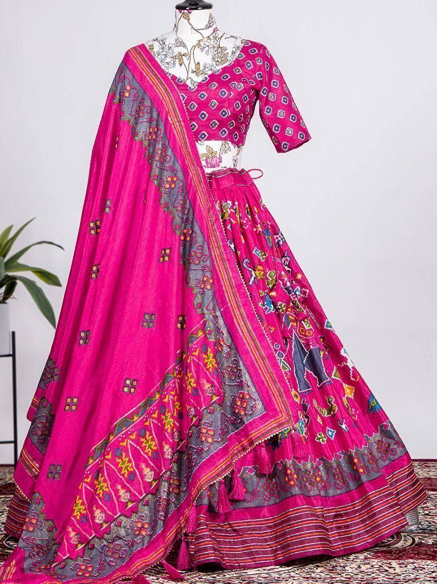 Vibrant pink embroidered lehenga choli with grey dupatta, traditional Indian ethnic wear for festive occasions
