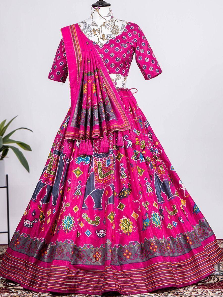 Vibrant pink printed lehenga choli with elephant motifs, perfect for Indian ethnic wear occasions