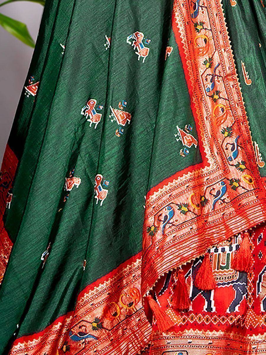 Green ethnic lehenga with red border, elephant & bird motifs, traditional Indian print design
