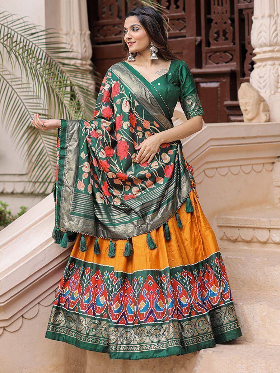Green floral saree with orange lehenga, ethnic Indian wear for festive occasions