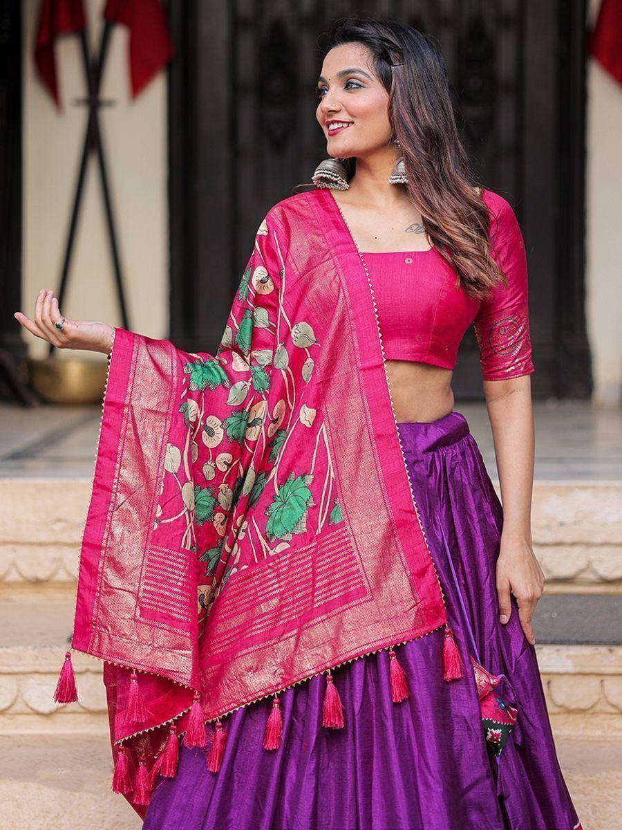 Pink and purple ethnic lehenga choli with floral dupatta, perfect for Indian weddings and festive occasions