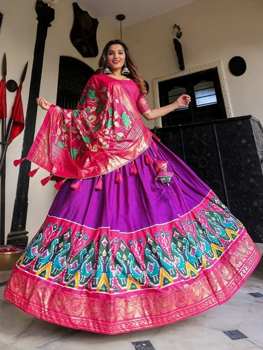 Vibrant pink and purple designer lehenga choli with floral dupatta, perfect for Indian ethnic occasions