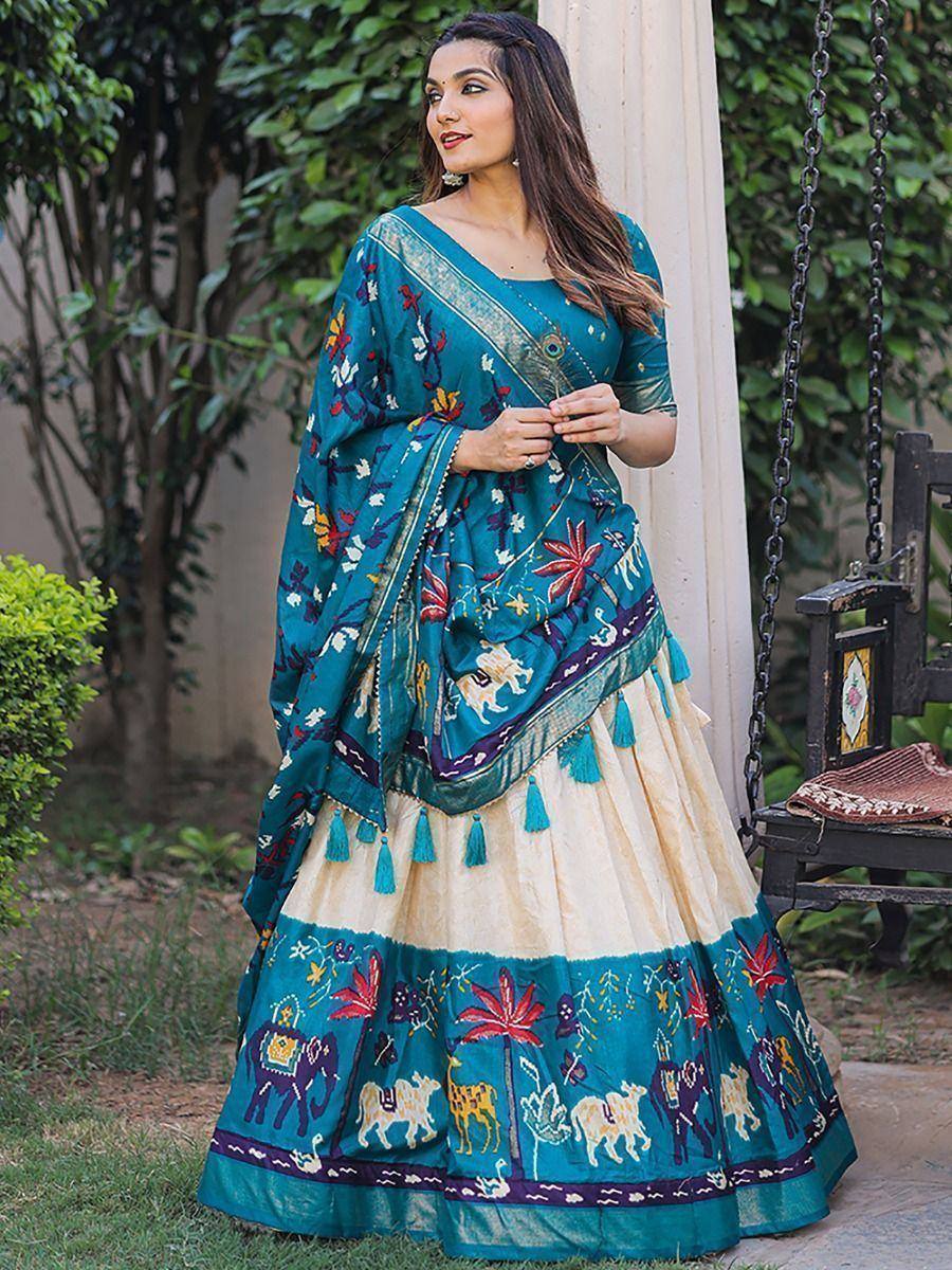 Teal embroidered lehenga choli with elephant print, perfect for Indian ethnic wear occasions