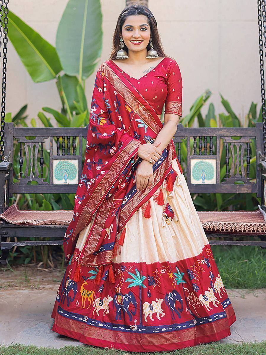 Red and cream printed lehenga choli with elephant and peacock motifs, perfect for Indian ethnic occasions