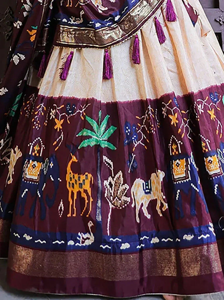 Ethnic lehenga with elephant, deer & palm tree embroidery, purple & cream designer skirt