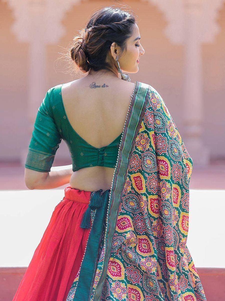 Green backless blouse with red lehenga and floral dupatta, Indian ethnic wear