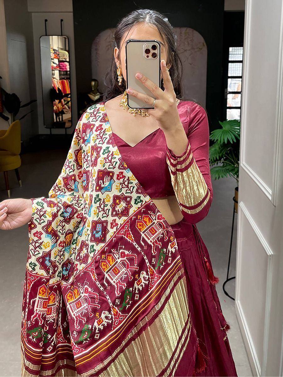 Maroon designer lehenga choli with colorful embroidered dupatta, ethnic Indian wear