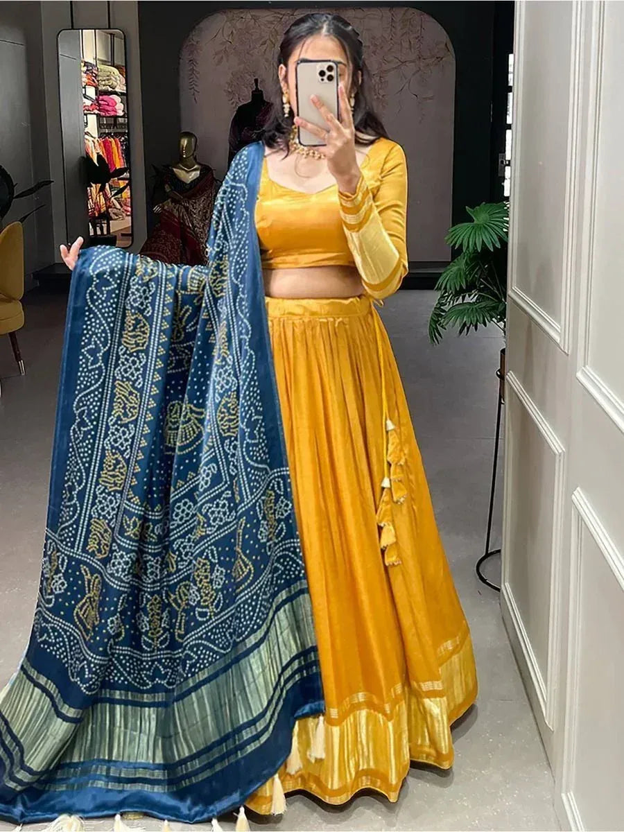 Yellow velvet lehenga choli with blue printed dupatta, ethnic Indian wear for women