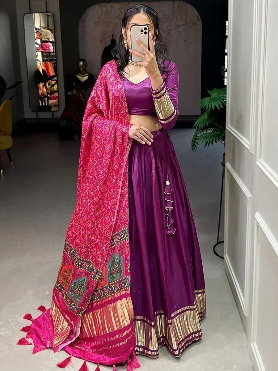 Purple lehenga choli with pink embroidered dupatta, ethnic Indian wear for weddings and festivals