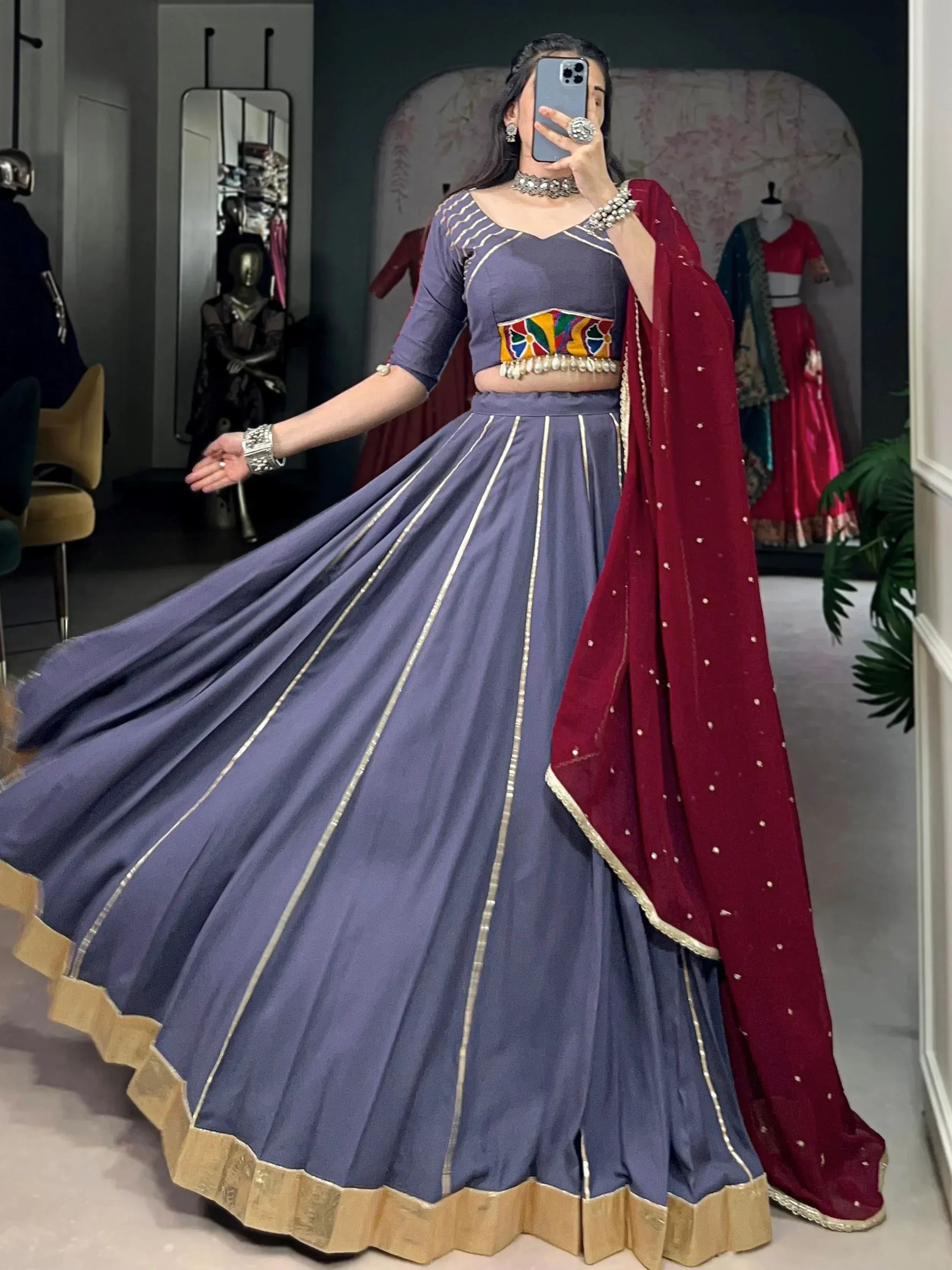 Purple lehenga choli with gold trim and red dupatta, Indian ethnic wear for weddings and festivals