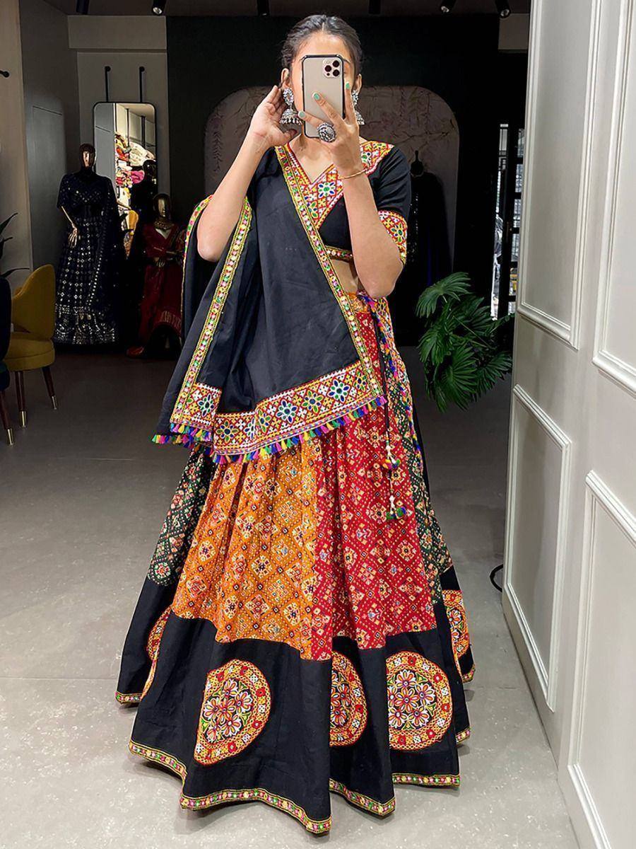 Black and colorful embroidered lehenga choli with mirror work, perfect for Indian ethnic wear occasions
