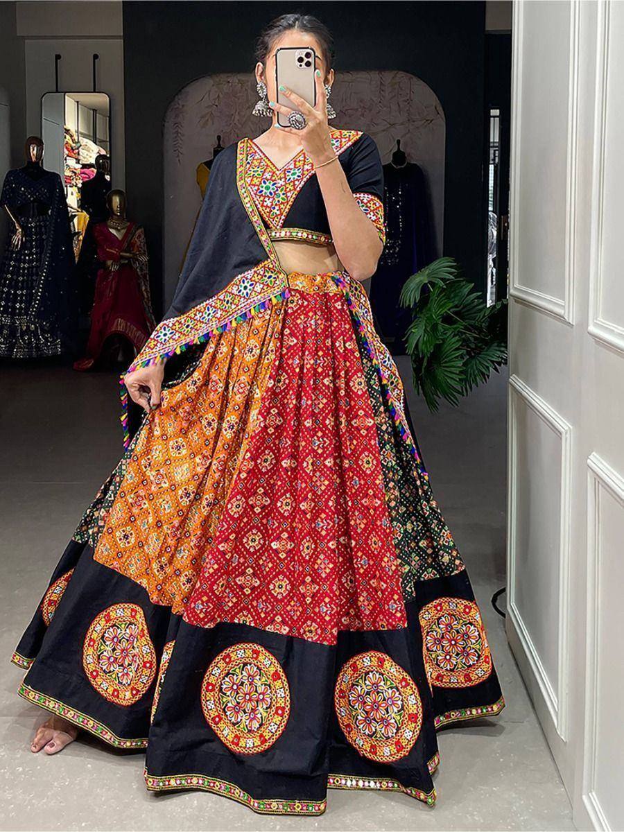 Vibrant Indian lehenga choli with mirror work, colorful embroidery, and patchwork skirt for ethnic wear