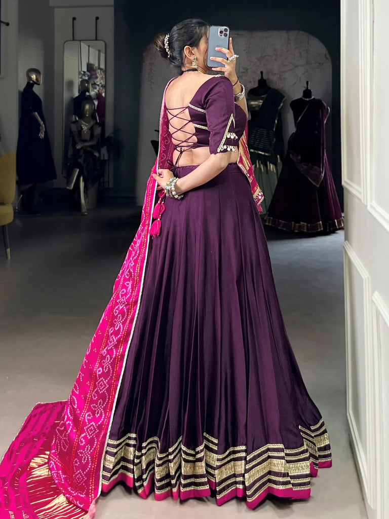 Purple lehenga choli with back lace-up design and pink dupatta, ethnic Indian wear