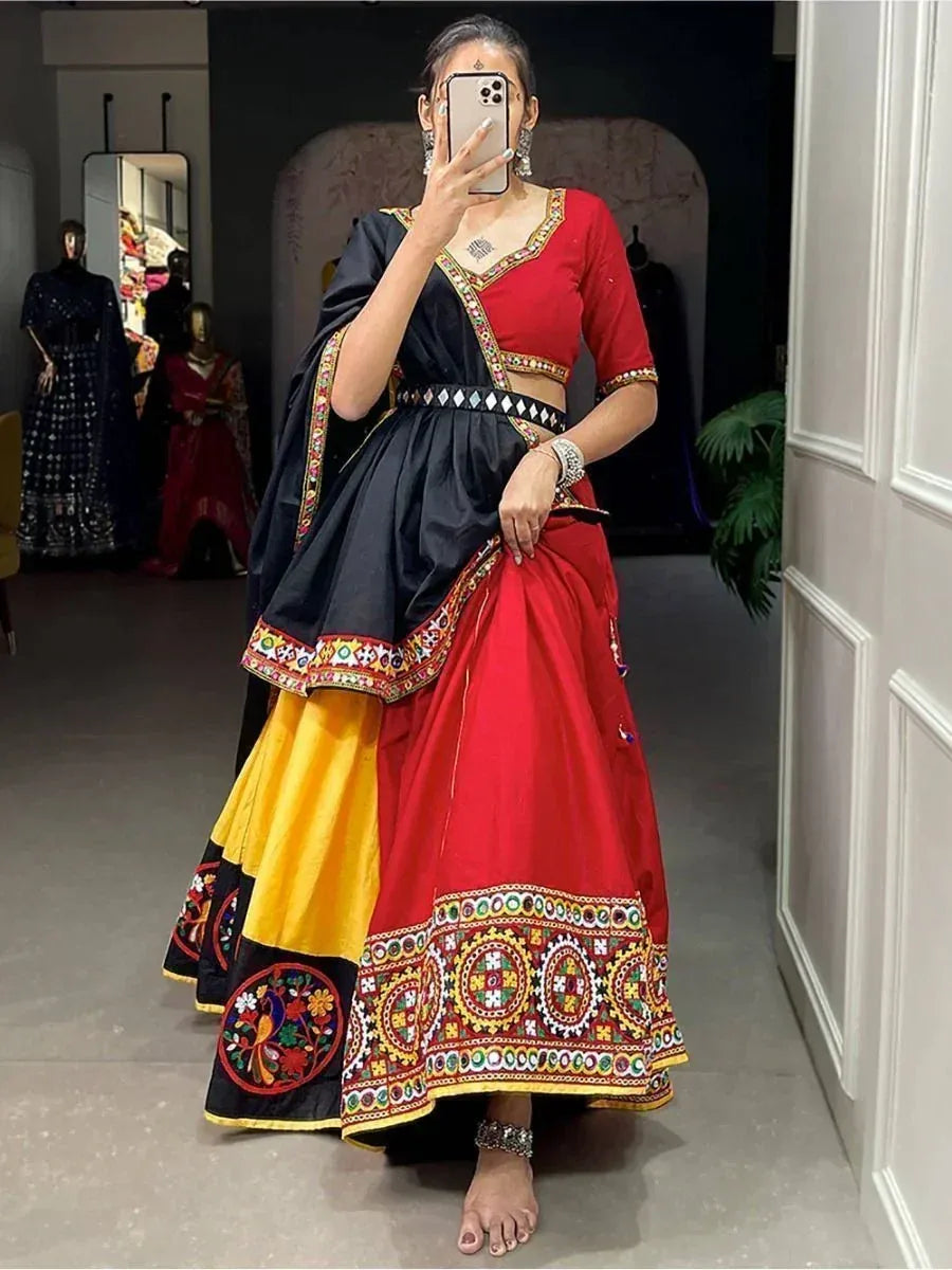 Red and black embroidered lehenga choli with mirror work, perfect for Indian ethnic wear occasions