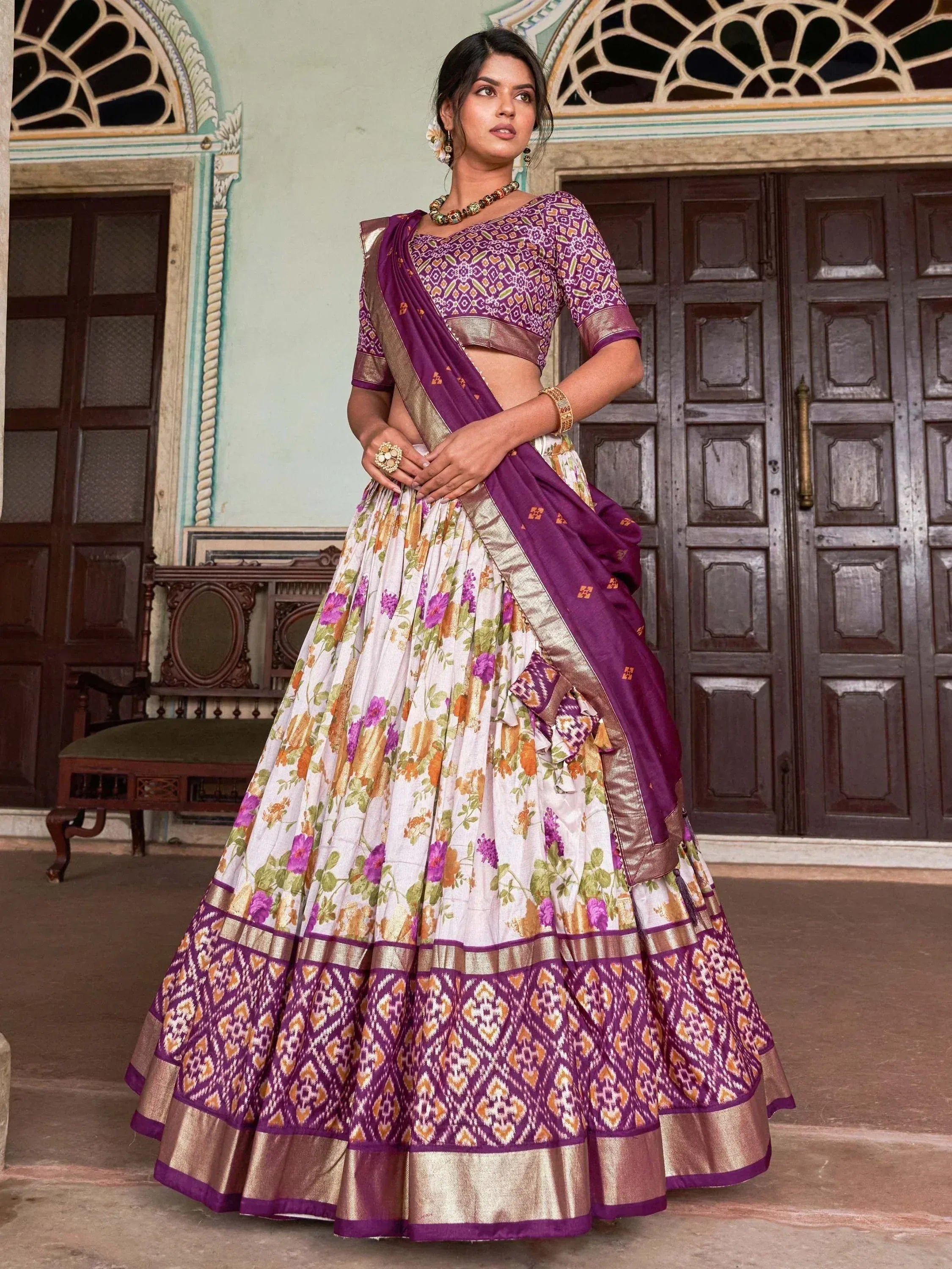 Purple and floral print lehenga choli with gold border, traditional Indian ethnic wear for women