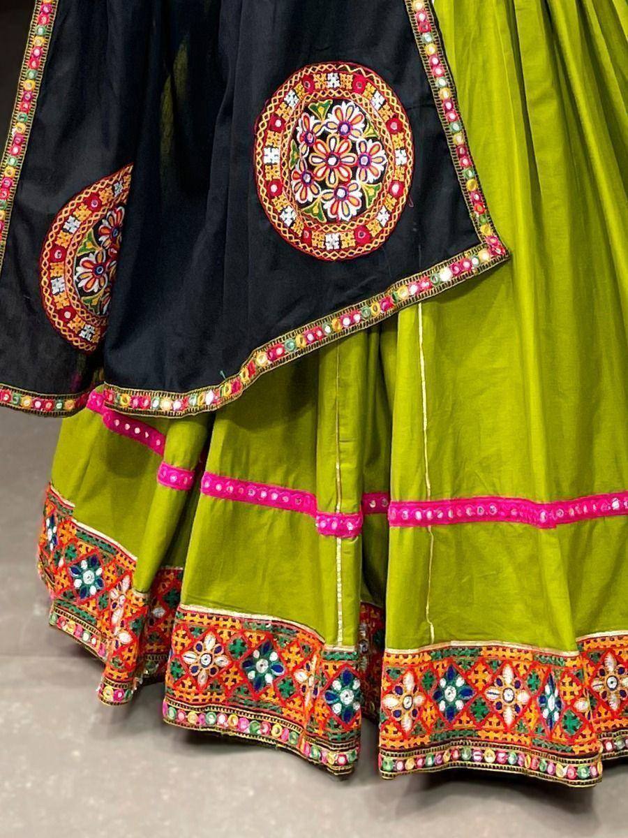 Black and lime green ethnic lehenga with colorful floral embroidery and mirror work details